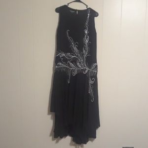 Black "flapper style dress".